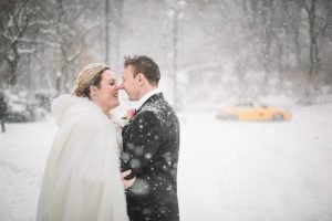 winter wedding central park couple in snow storm 4