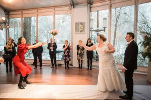 winter wedding tavern on the green throwing the wedding bouquet