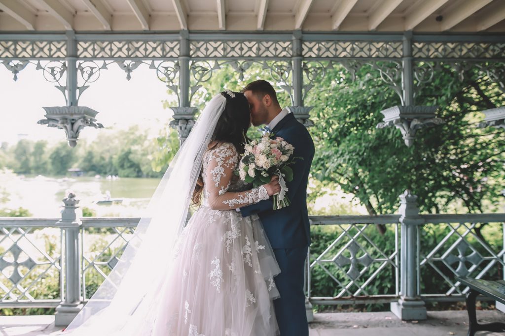 summer wedding central park ladies pavilion brazilian couple kissing